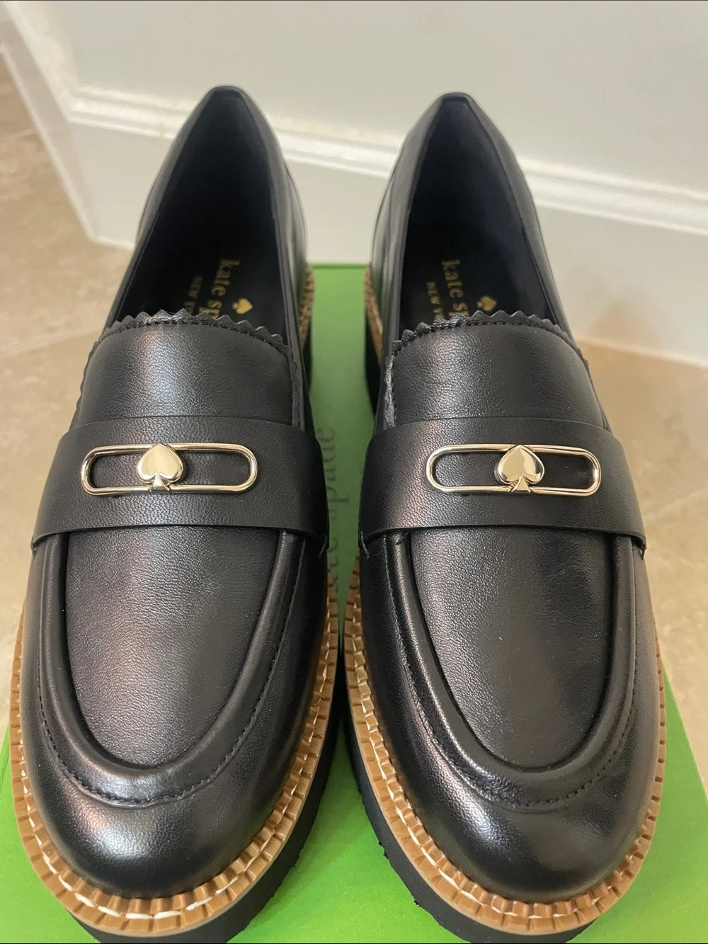 kate spade Black Leather Platform Loafers with Gold Spade Accent